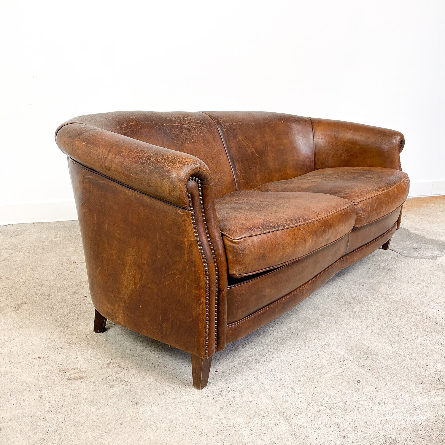 Vintage sheep leather three seater club sofa