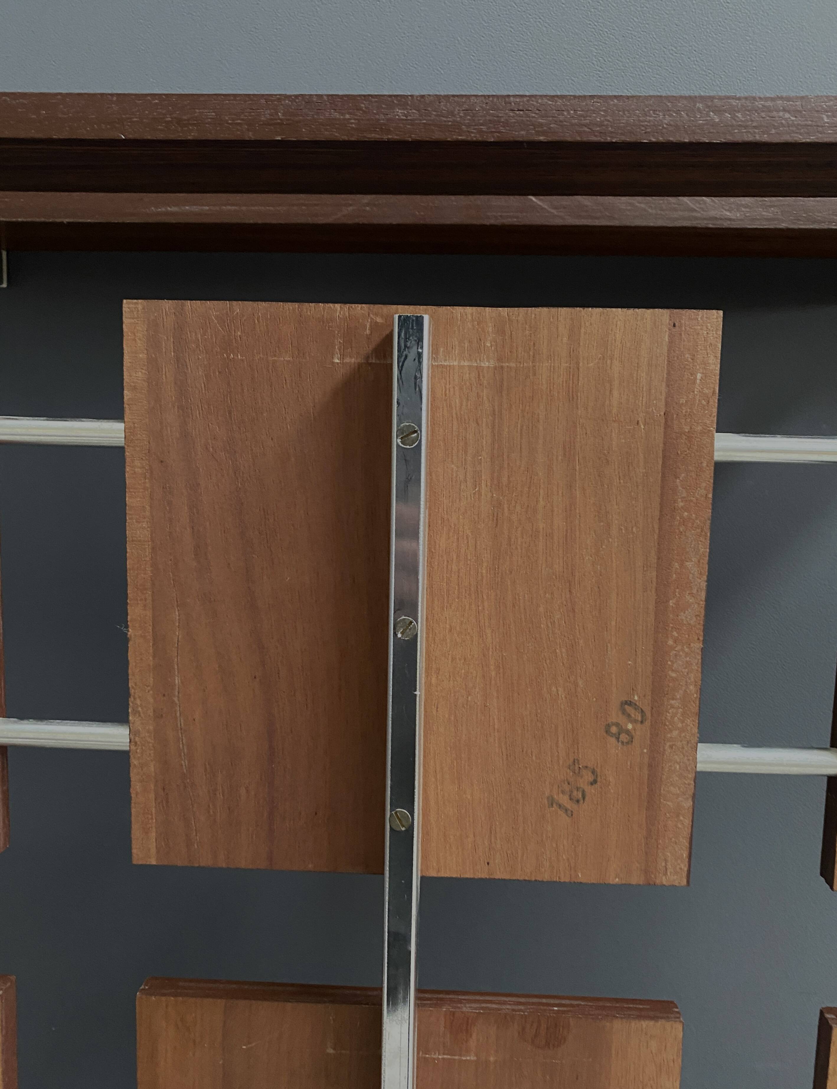 Coat rack wall unit in palisander wood veneer and chrome 1960s