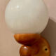 Vintage white glass wall light and pin.