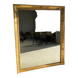 Golden mirror style Restoration decorated with stretched palmettes