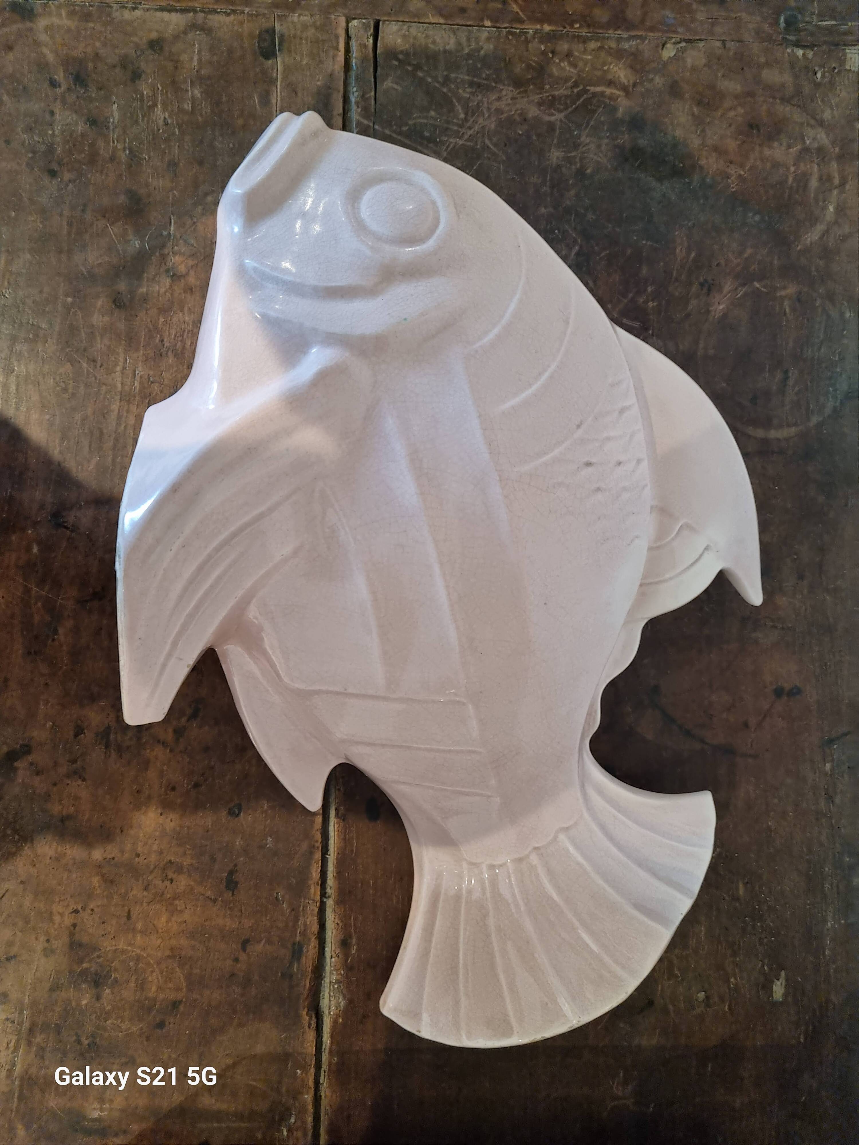 Poisson le jan signe