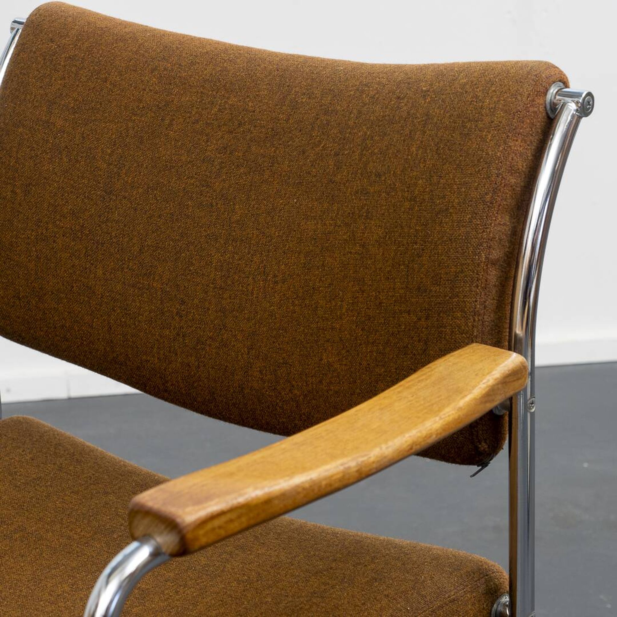 Armchair, 1960s, chrome metal frame, teak armrests.