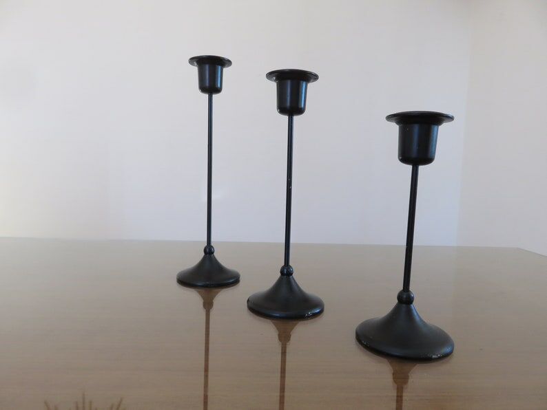Series of 3 Scandinavian candle holders in black lacquered metal 60s 70s