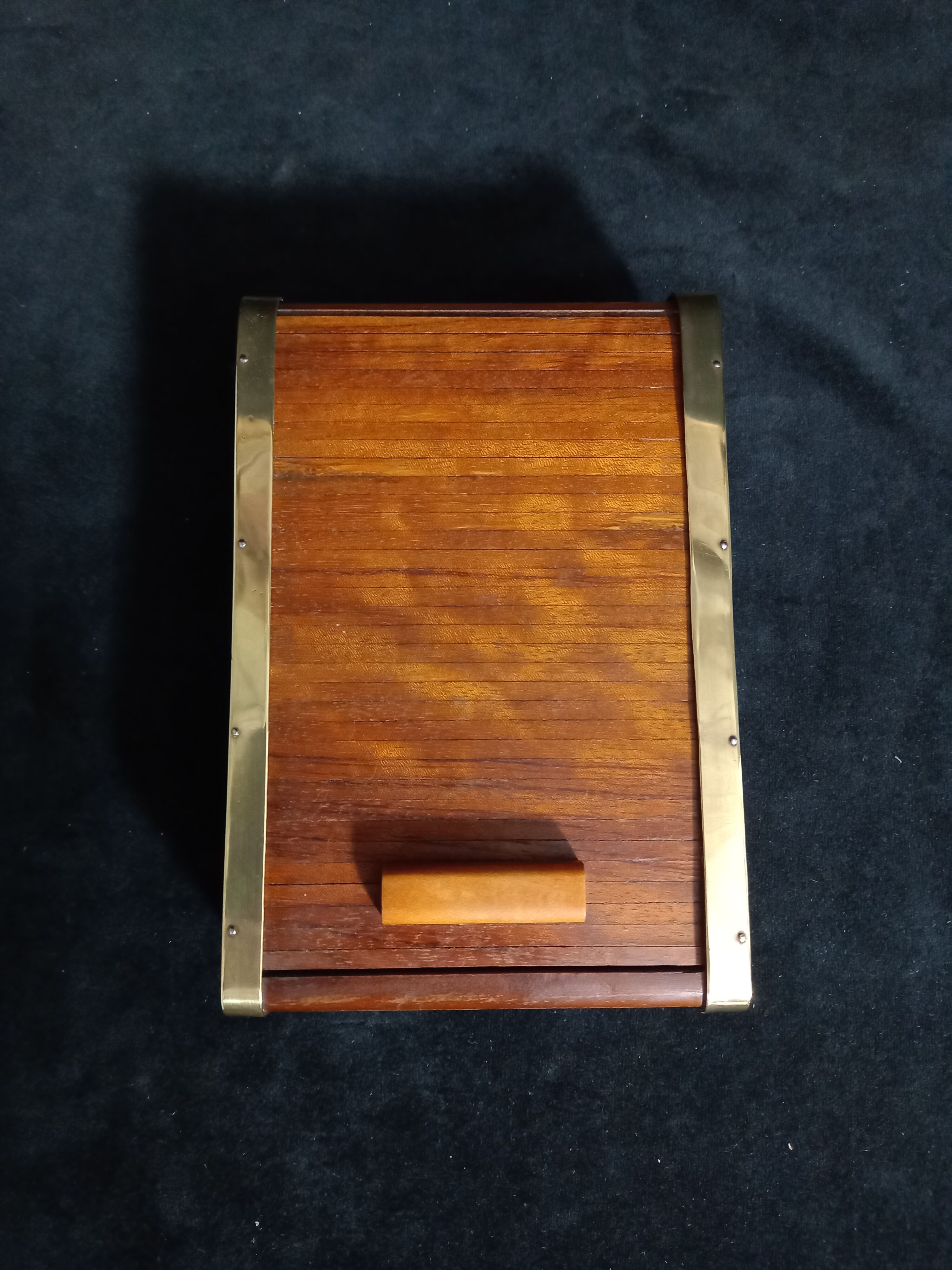 Art deco cigar box with sliding lid and brass finishes