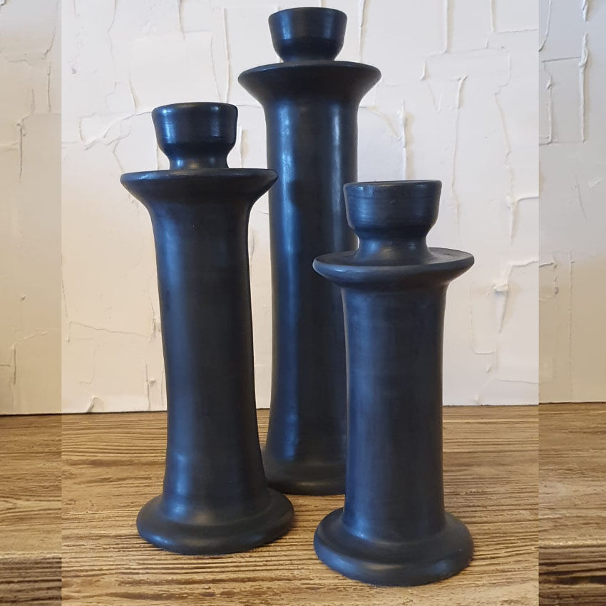 Set of three candlesticks in black tadelakt