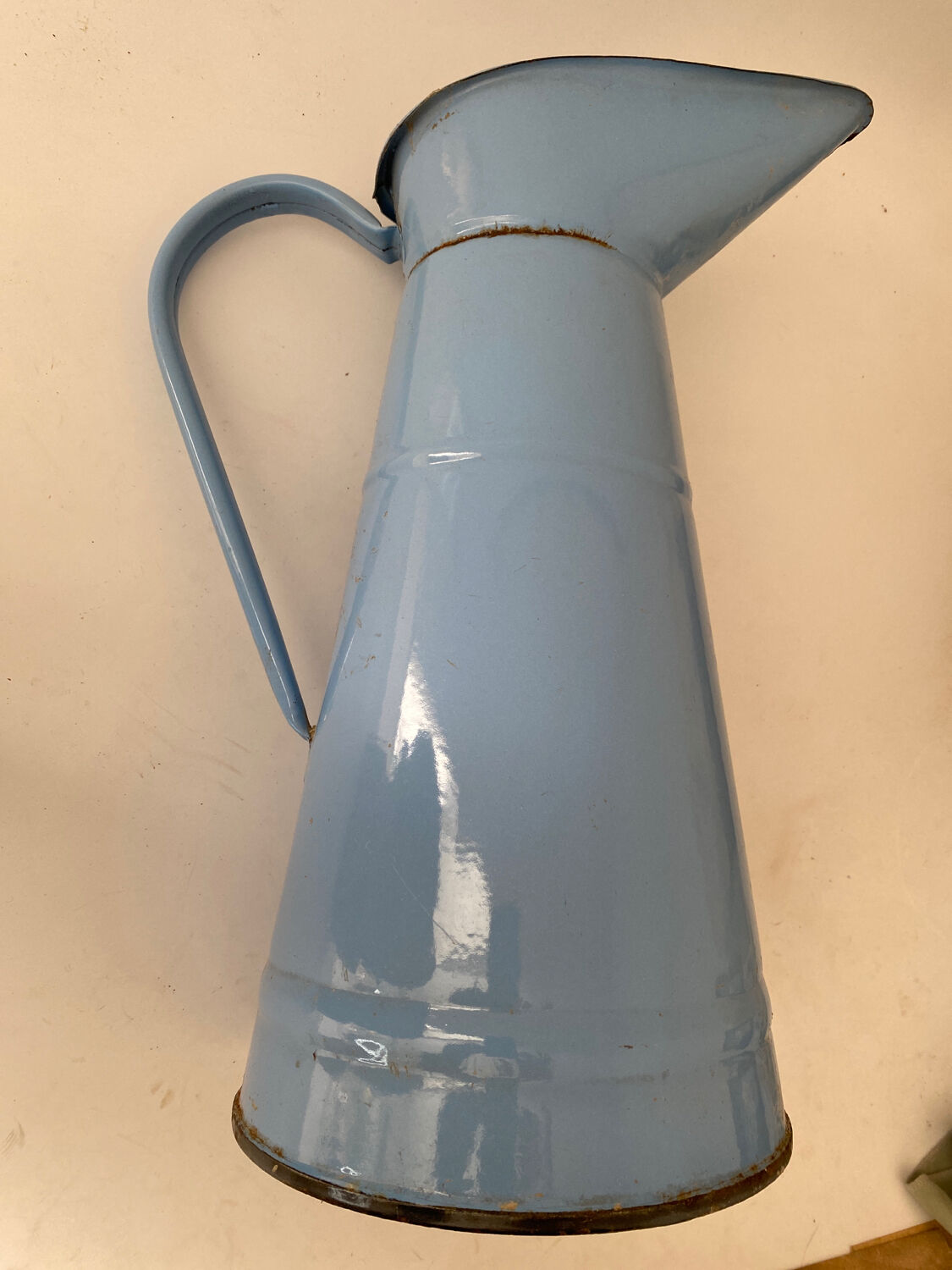 Blue watering can