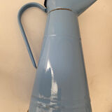 Blue watering can
