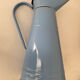 Blue watering can