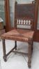 Henri II leather and straw chair in very good condition.
