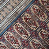 Tapis Vintage Bukhara en Laine, Années 1960, Élégance Traditionnelle