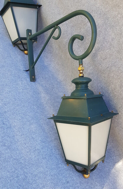 Pair of antique lanterns on its gallows