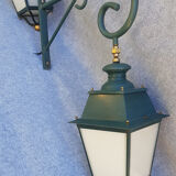 Pair of antique lanterns on its gallows