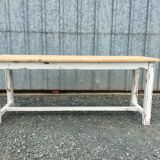 Farmhouse table with its two benches