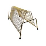 Vintage brass vinyl holder with black legs
