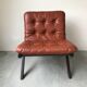 Scandinavian folding armchair in cognac leather