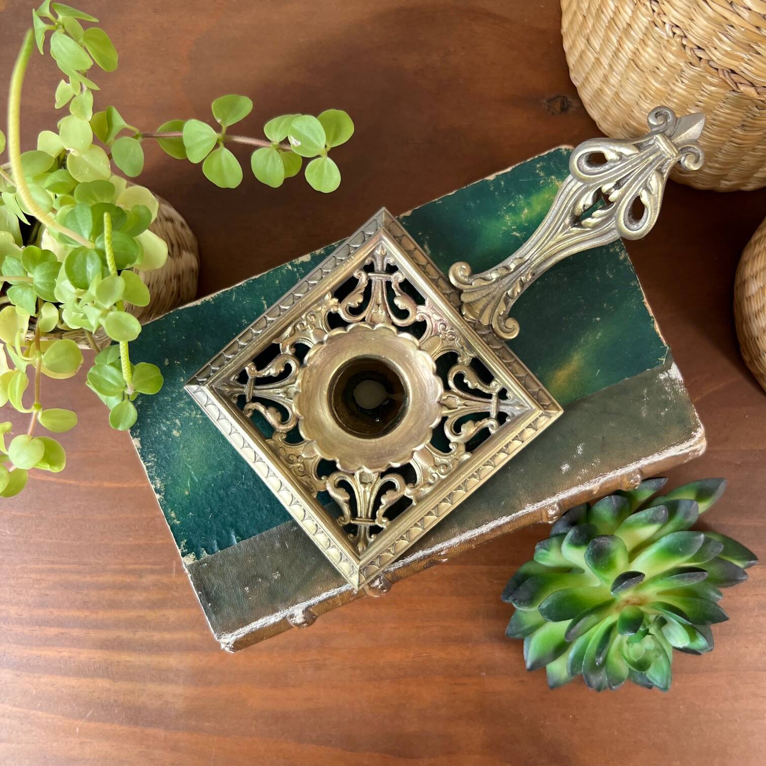 Bronze cellar rat candle holder