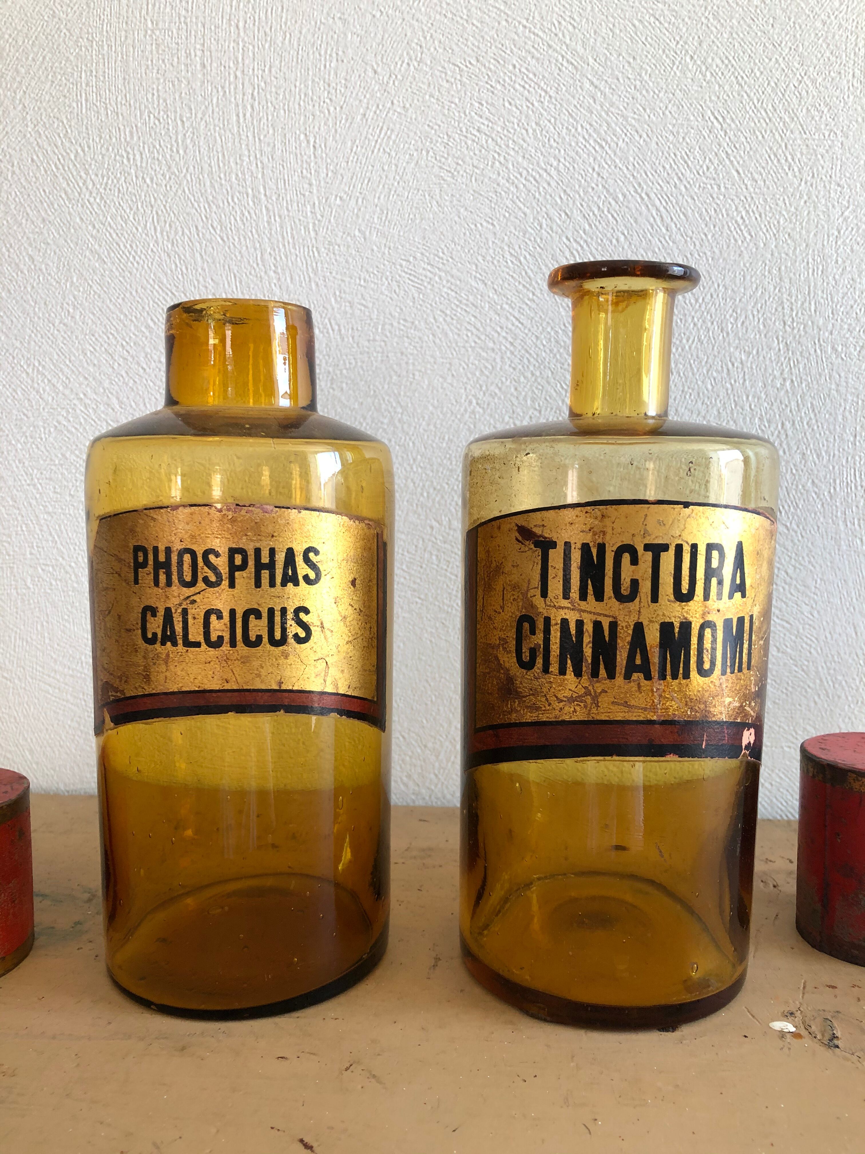 Lots of old brown glass pharmacy jars bottles