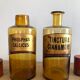 Lots of old brown glass pharmacy jars bottles
