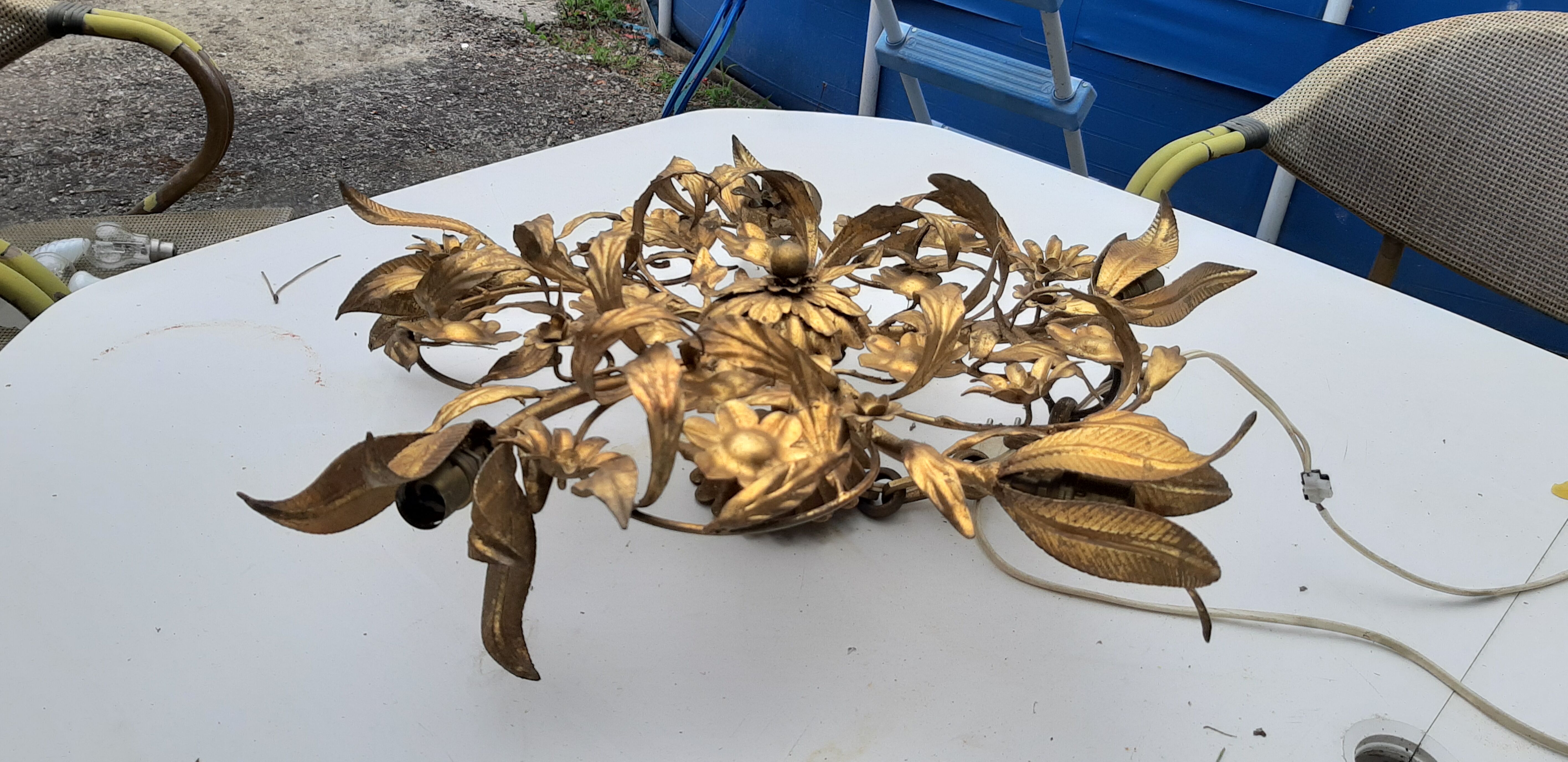 Vintage chandelier in gilded metal