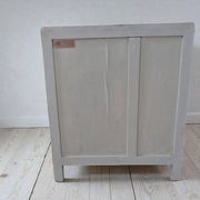 Small chest of drawers with pigments