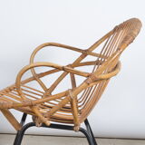Rattan shell armchair with armrests