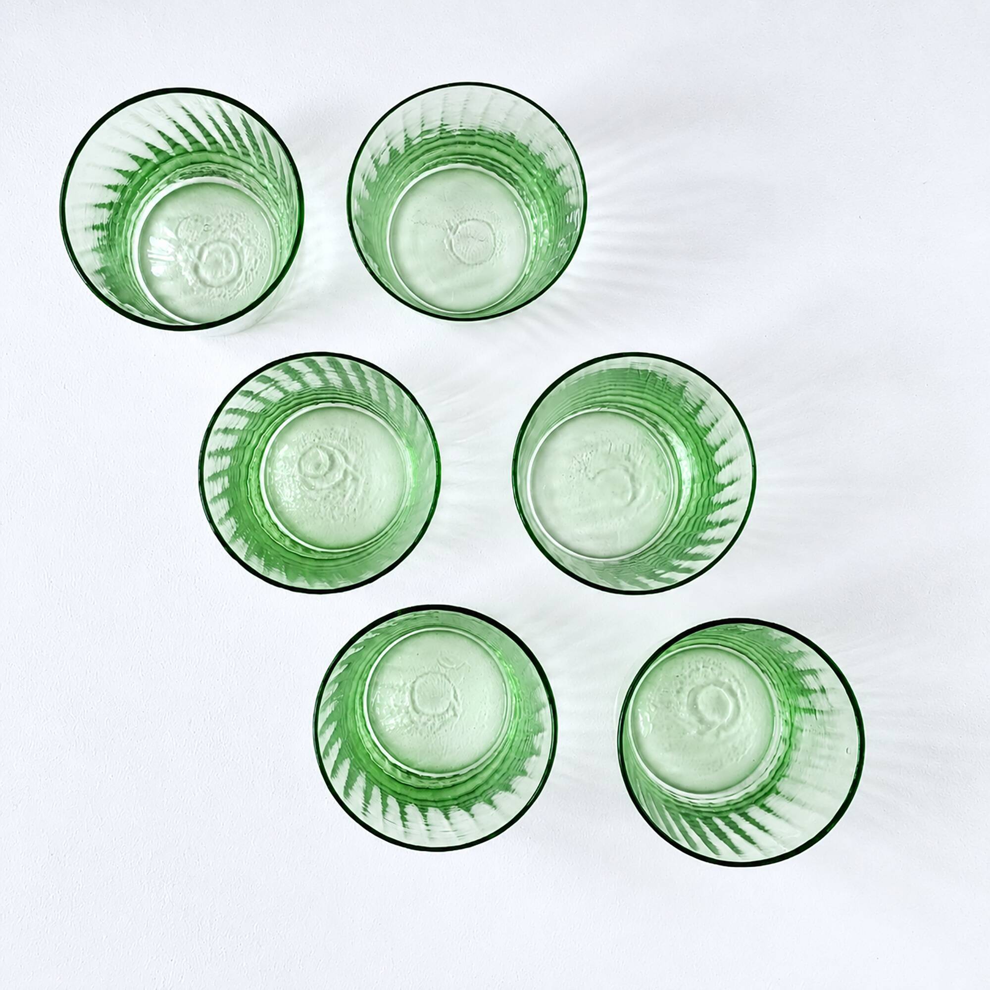 Set of 6 antique green blown glass goblets with fine fluting.