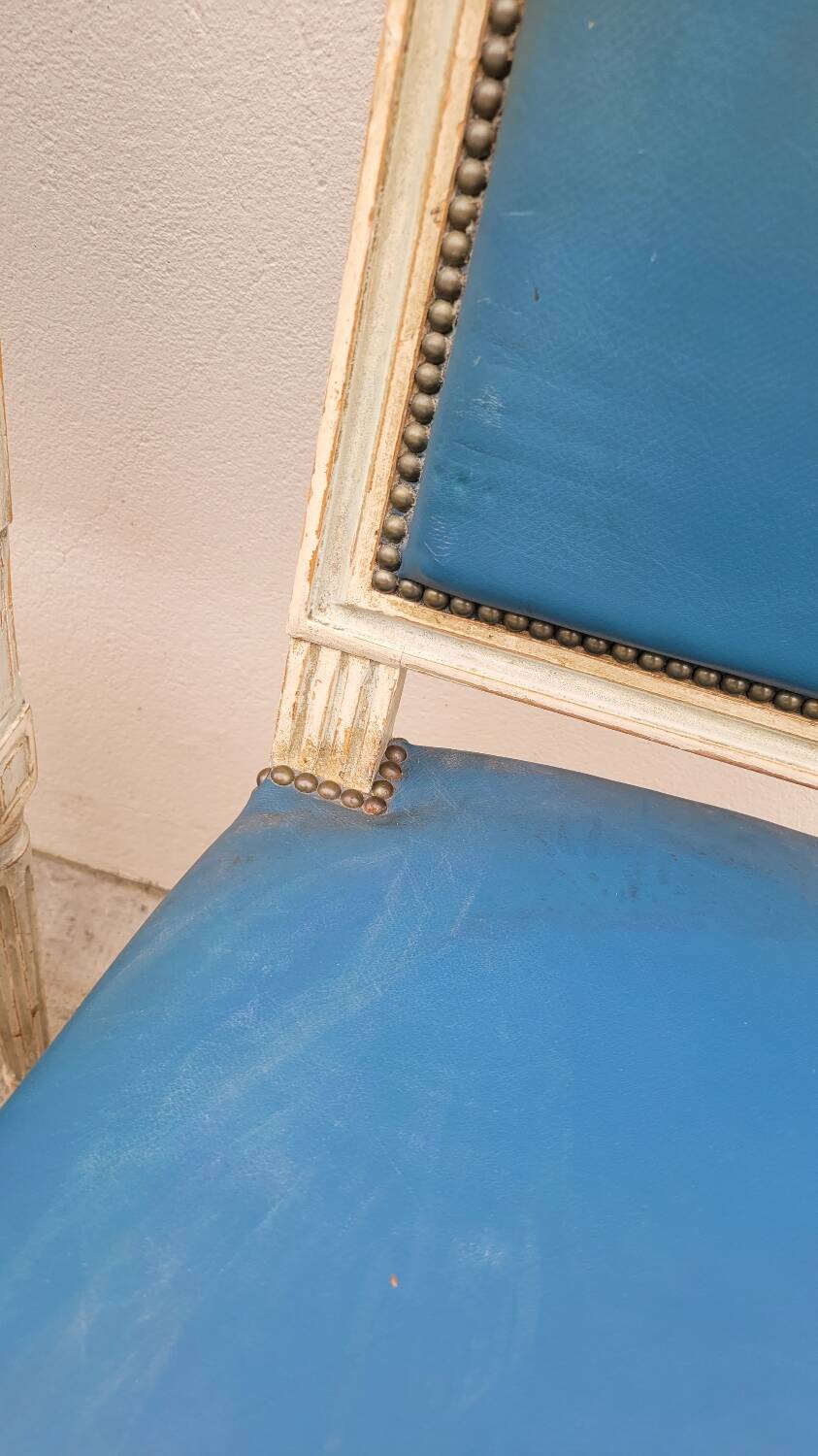 Pair of antique Louis XVI style chairs with patina