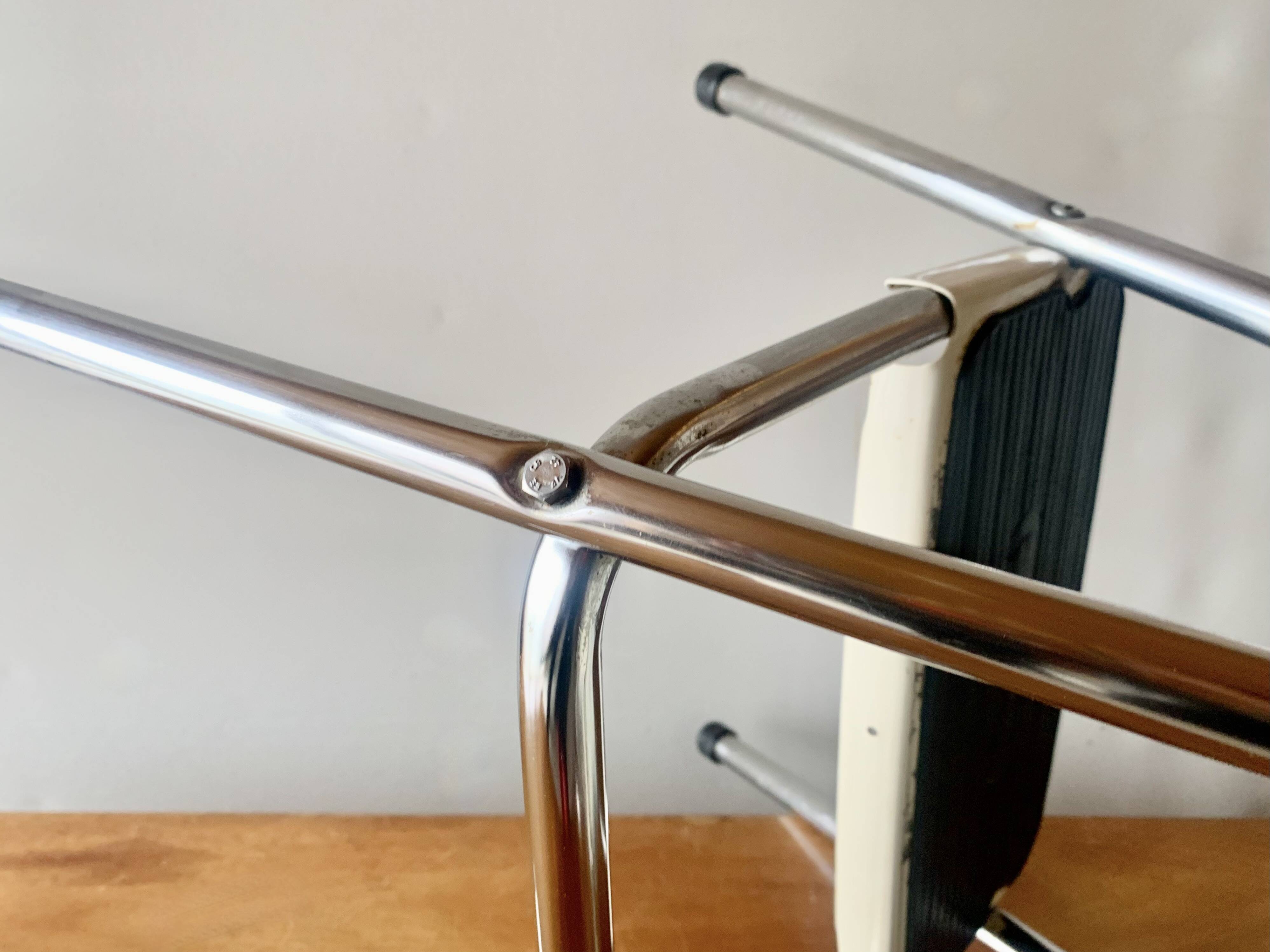 Vintage cosco step stool chair in chrome steel and white skai