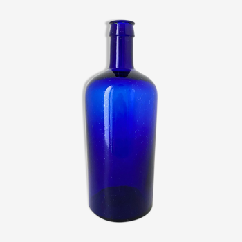 Flacon vintage en verre bleu