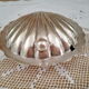 Vintage buttermaker in silver metal form scallop