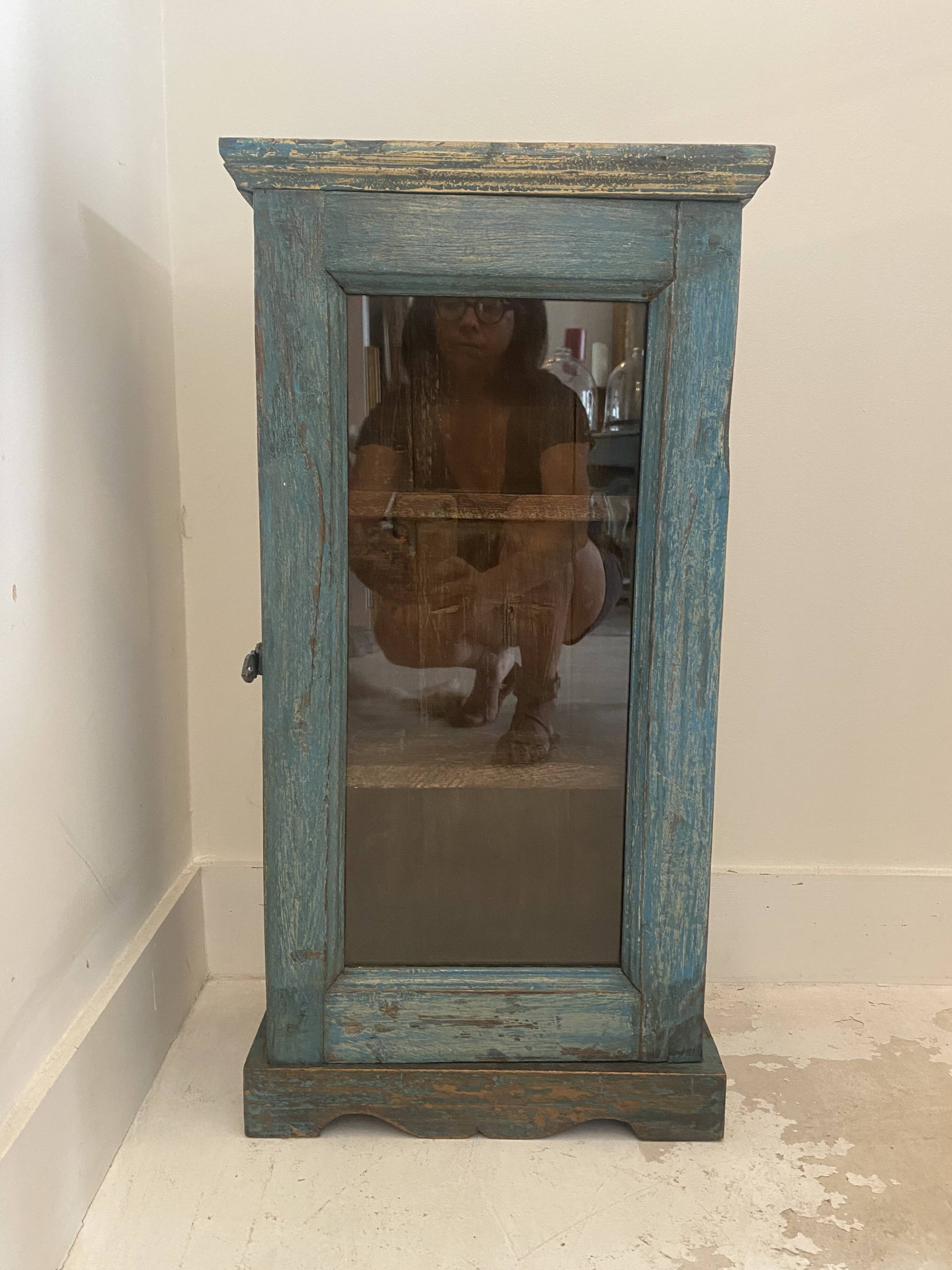 Small wall display case in blue lacquered teak