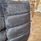 Togo sofa by Ligne Roset and its pouf from the 1970s.