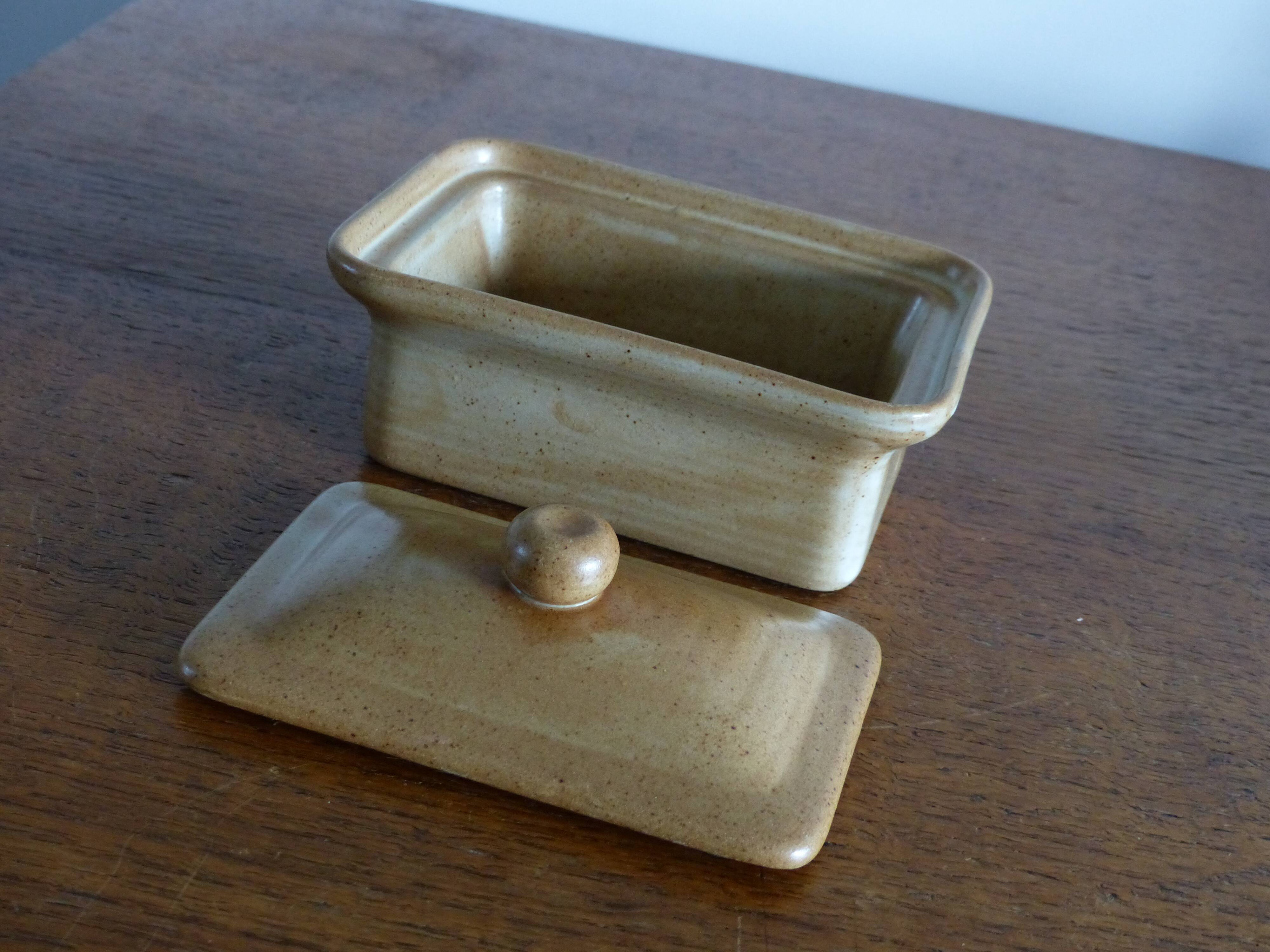 Butter maker in "sandstone village france"