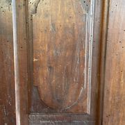 France old 18th century walnut closet door. Composed of 8 finely carved panels.