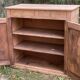 Small Parisian buffet with 2 doors and 2 drawers in light wood.
