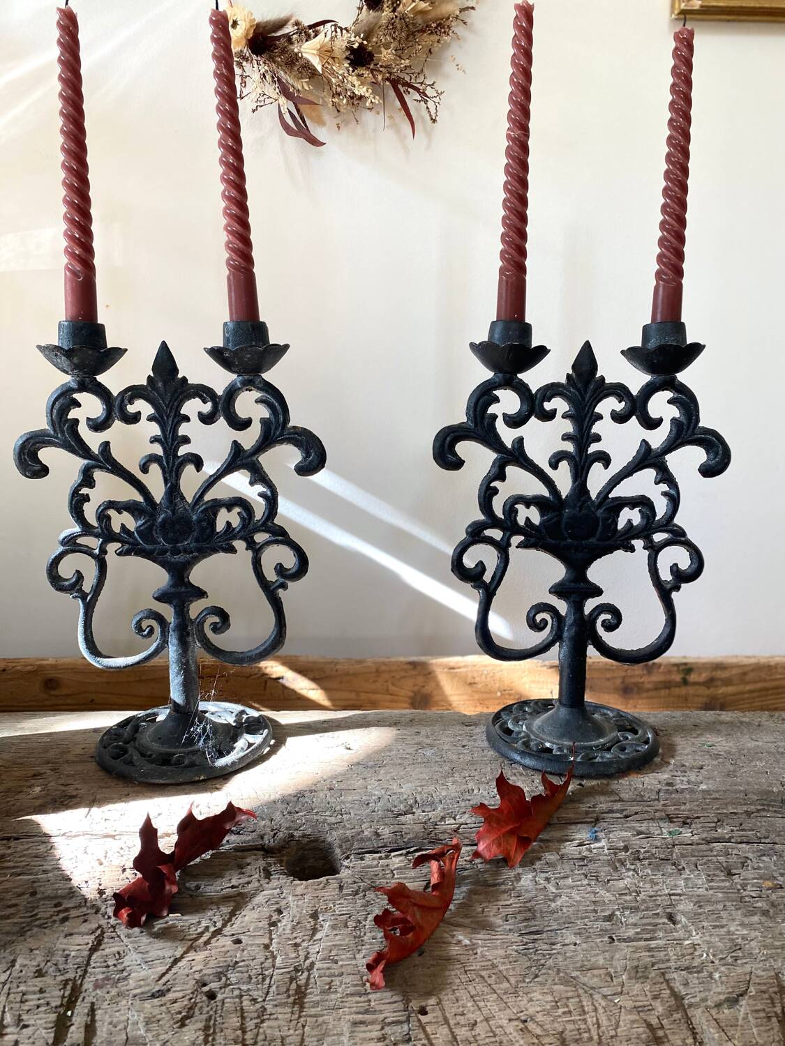Black cast iron candlesticks, early 20th century, Neo-Rococo