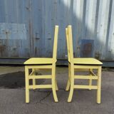 Pair of wooden and yellow formica chairs