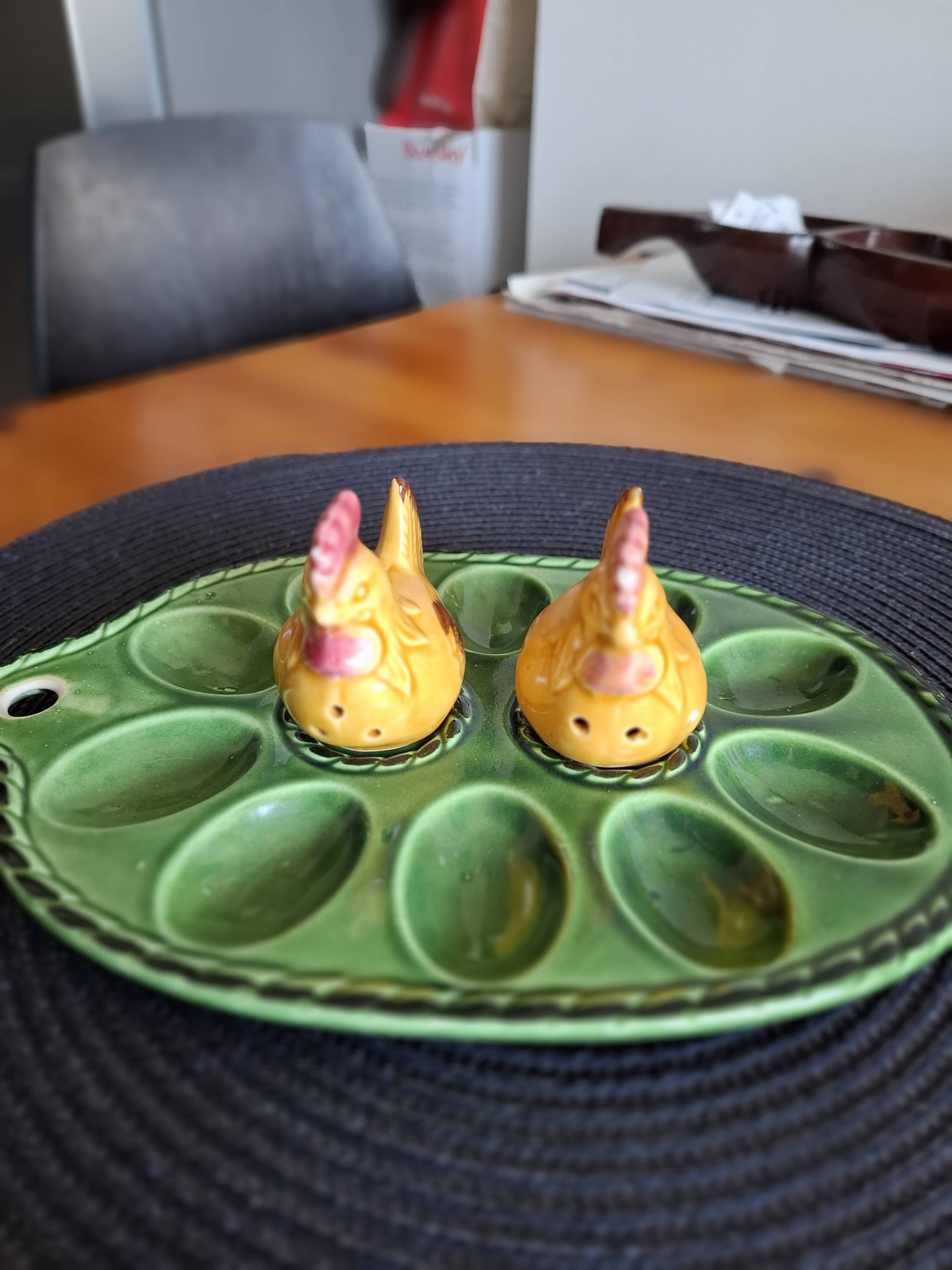 Earthenware egg dish with chicken-shaped salt and pepper shakers