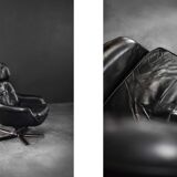 Vintage black leather swivel chair in mid-century modern Scandinavian style.