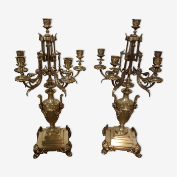 A pair of candle holders