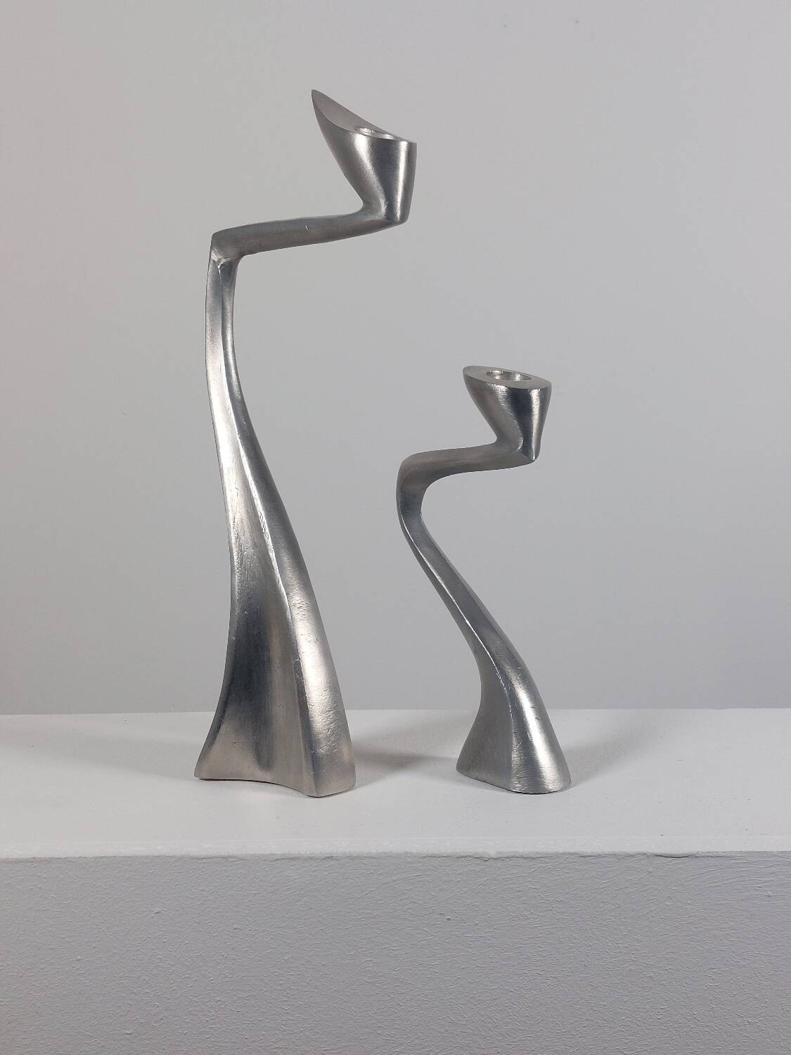 Pair of postmodern aluminium candlesticks by Matthew Hilton