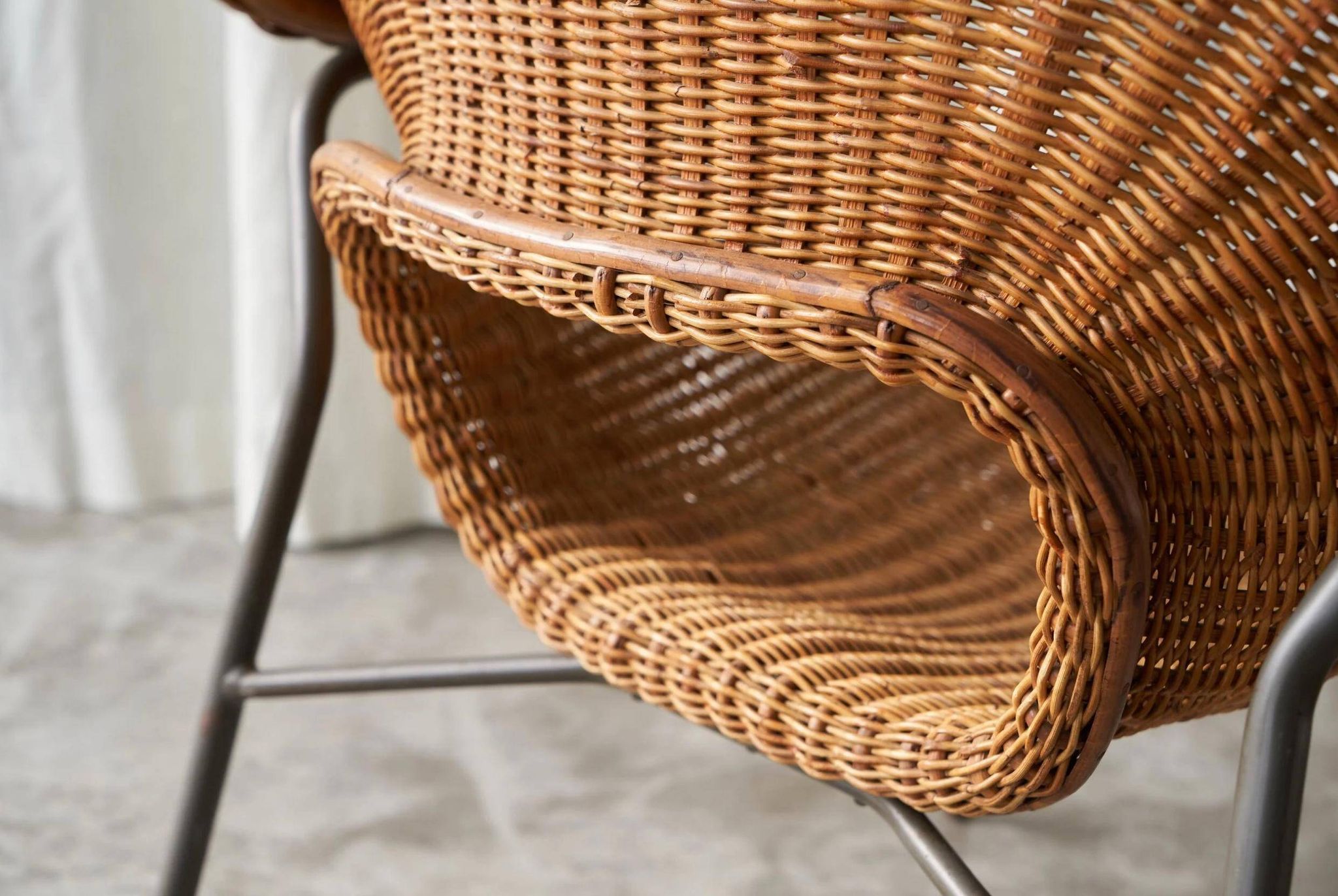 Sculptural lounge chair in rattan and metal, 1960s