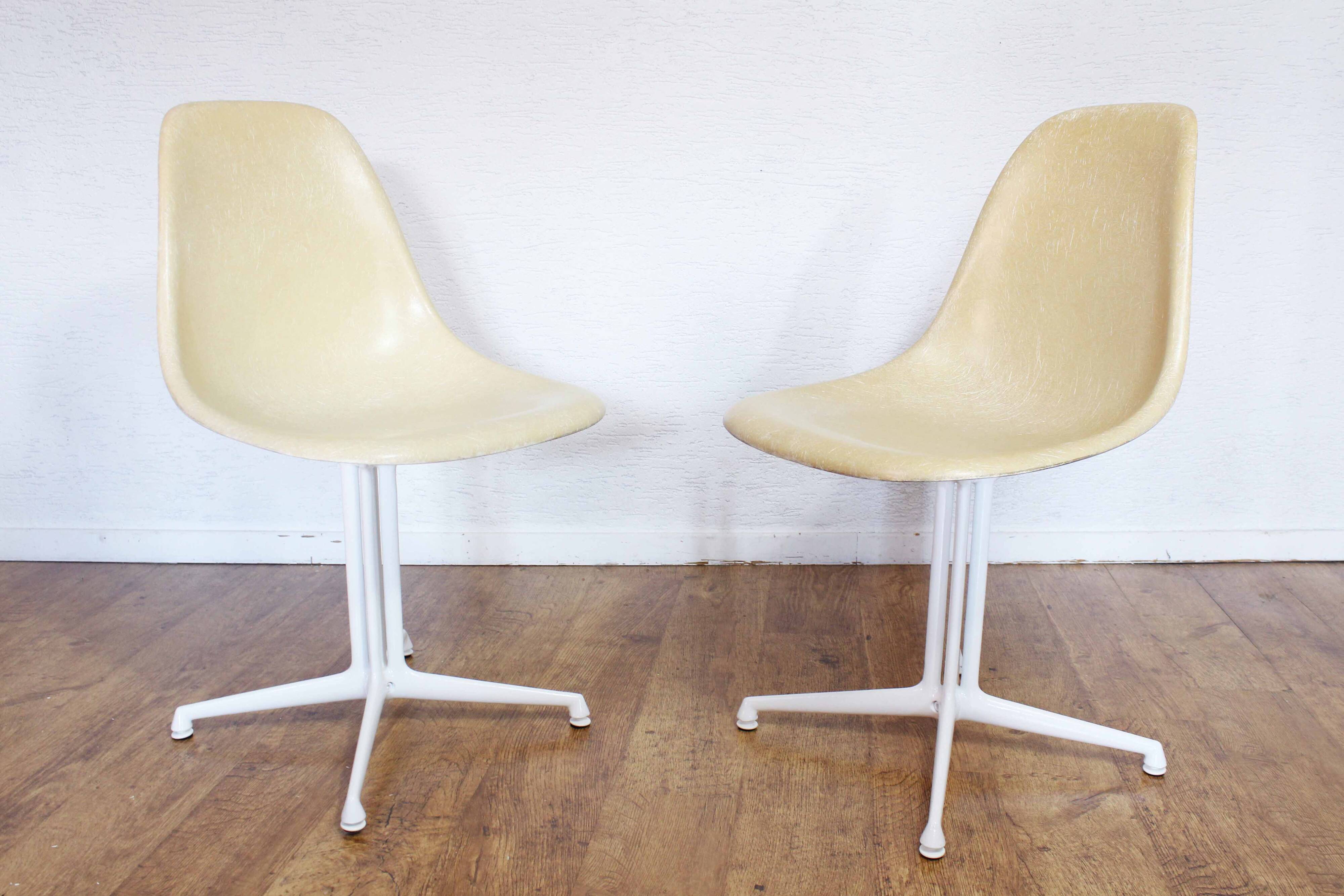 Pair of EAMES La Fonda fiberglass chairs 1970