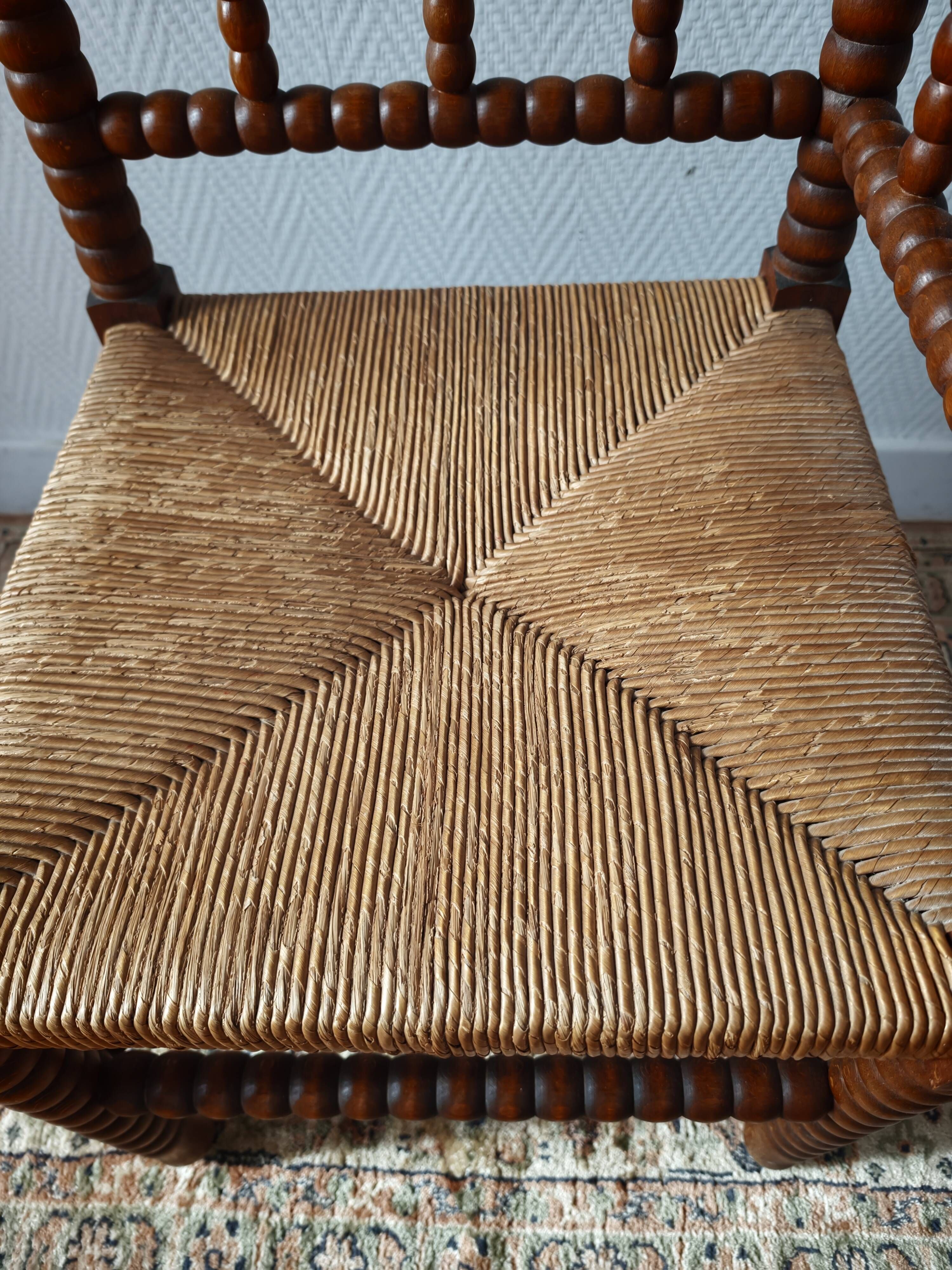 Chaise vintage coin du feu en bois tourné bobine