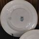 5 flat plates in Longwy earthenware model “Suzanne” Terre de Fer