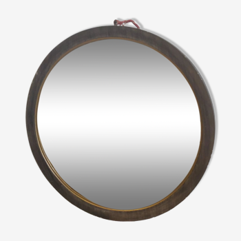Miroir circulaire en bois mouluré doré et verre biseauté