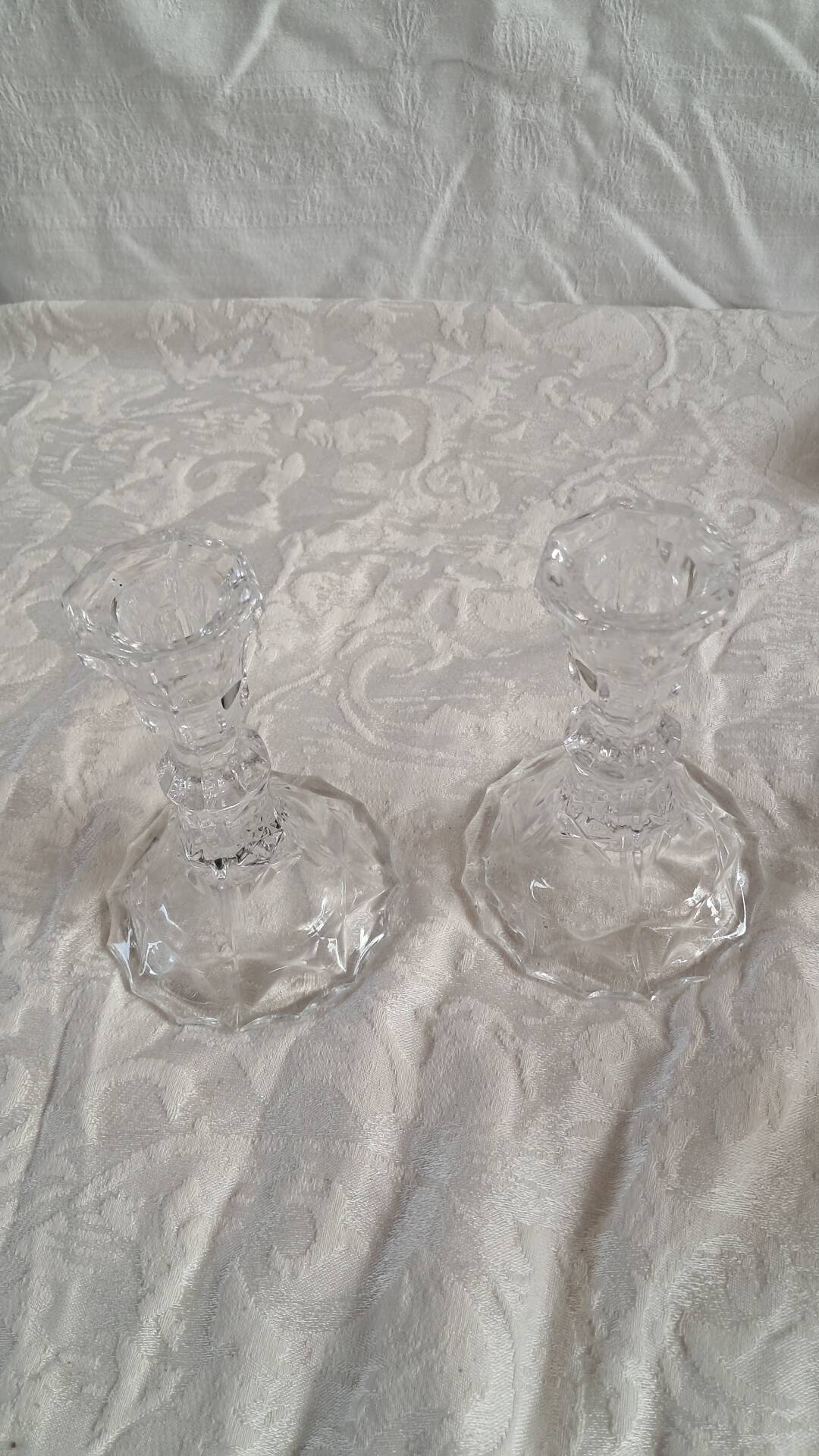 Pair of vintage glass candlesticks in clear glass