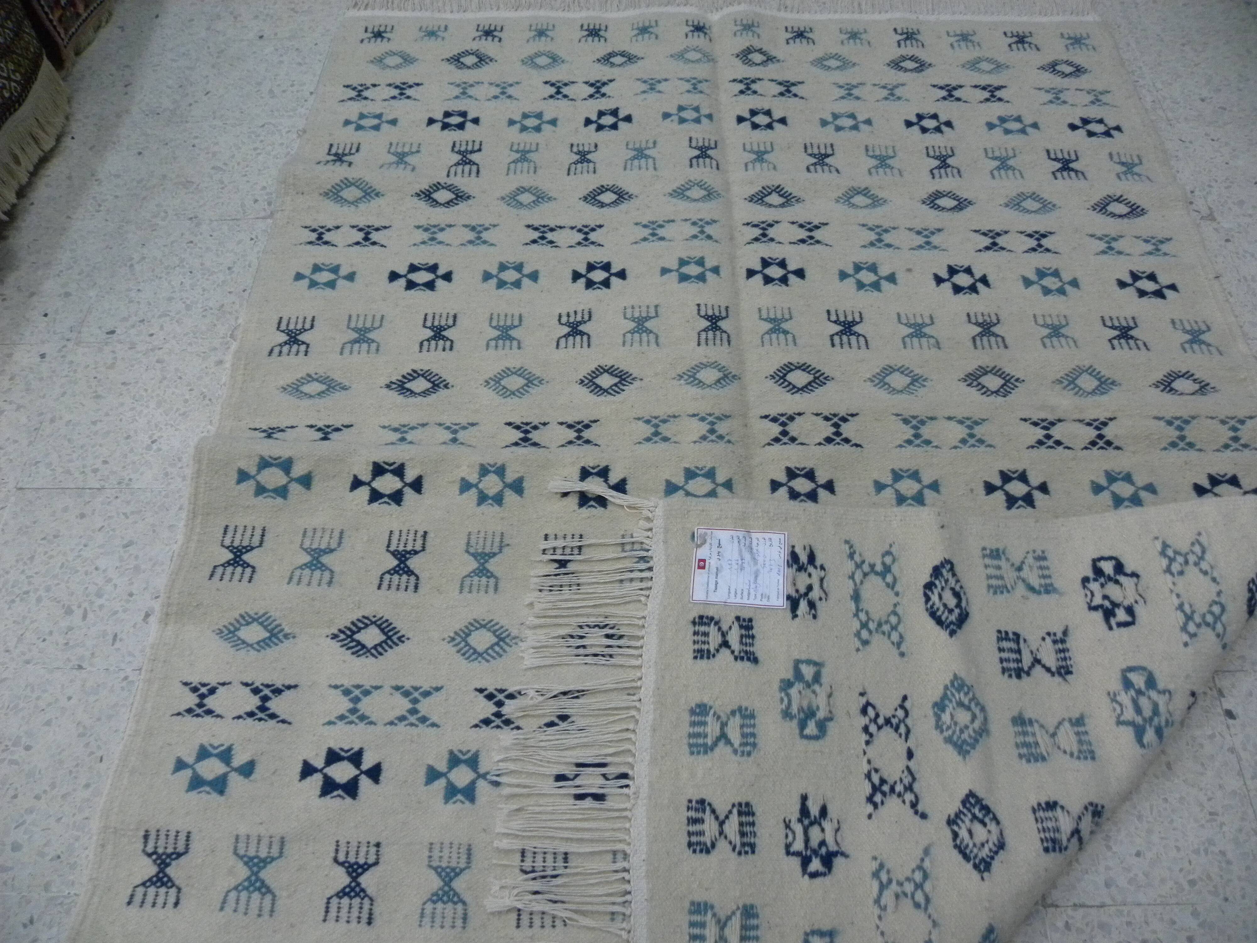 Nomadic Tunisian Berber rug, margoum kilim, ethnic in beige and blue wool.