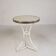 Bistro table with a marble top and brass edging, early 20th century.