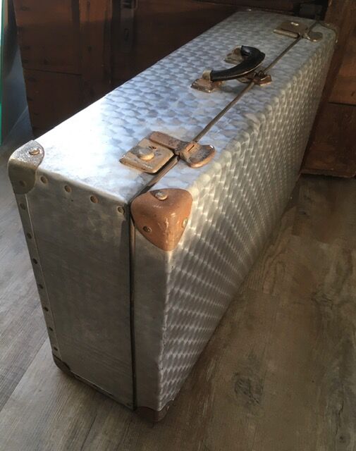 Large vintage suitcase in light metal